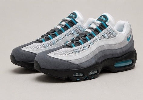 Nike Air Max 95 in a white/grey colourway with turquoise (blue) accents.
