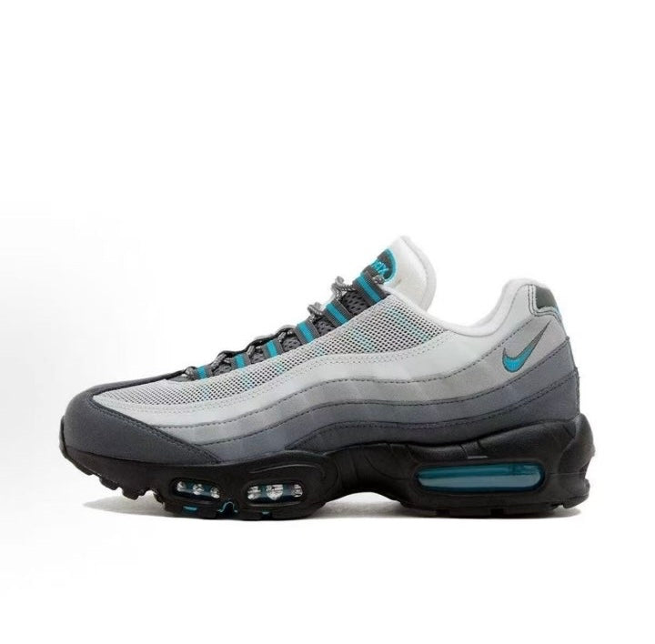 Nike Air Max 95 in a white/grey colourway with turquoise (blue) accents.